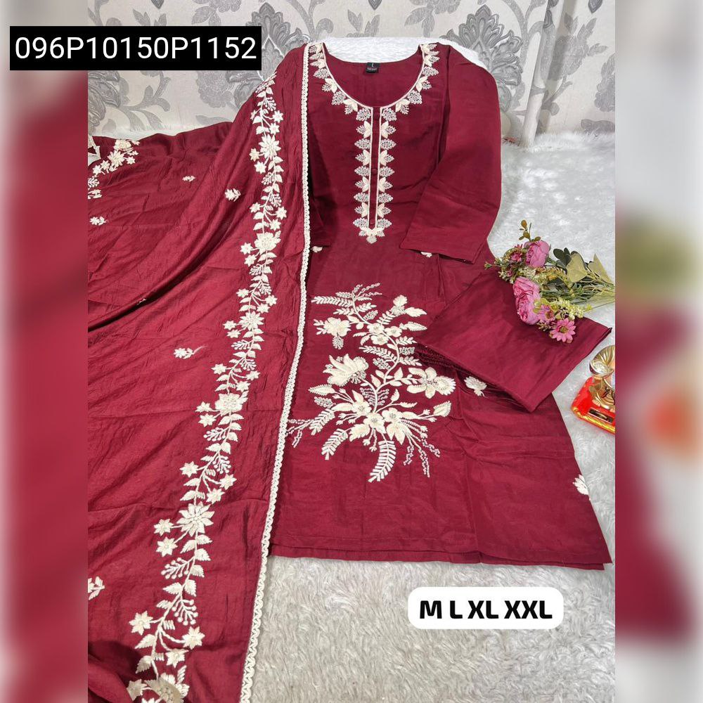 Full view of a maroon Roman Silk Pakistani suit set with intricate white Kolkata hand embroidery on the kurta and dupatta, spread on a white surface.