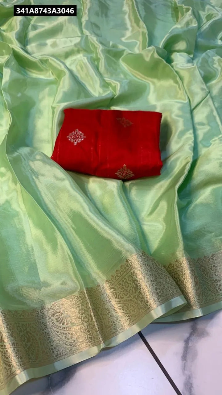 TRENDBUY Pastel Green Viscose Chinnon Saree with Red Jacquard Blouse, flat lay