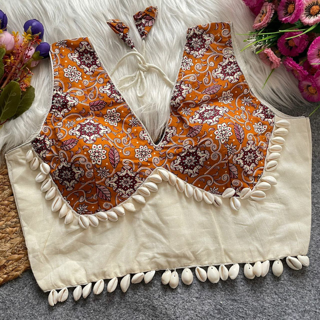 Close-up of intricate hand-printed Ajrakh geometric patterns on breathable cotton fabric.