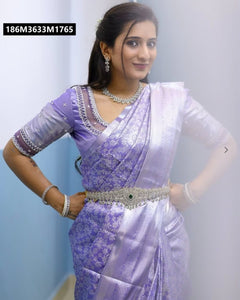 The KASTURI Lavender Banarasi Soft Silk Saree with Zari Weave