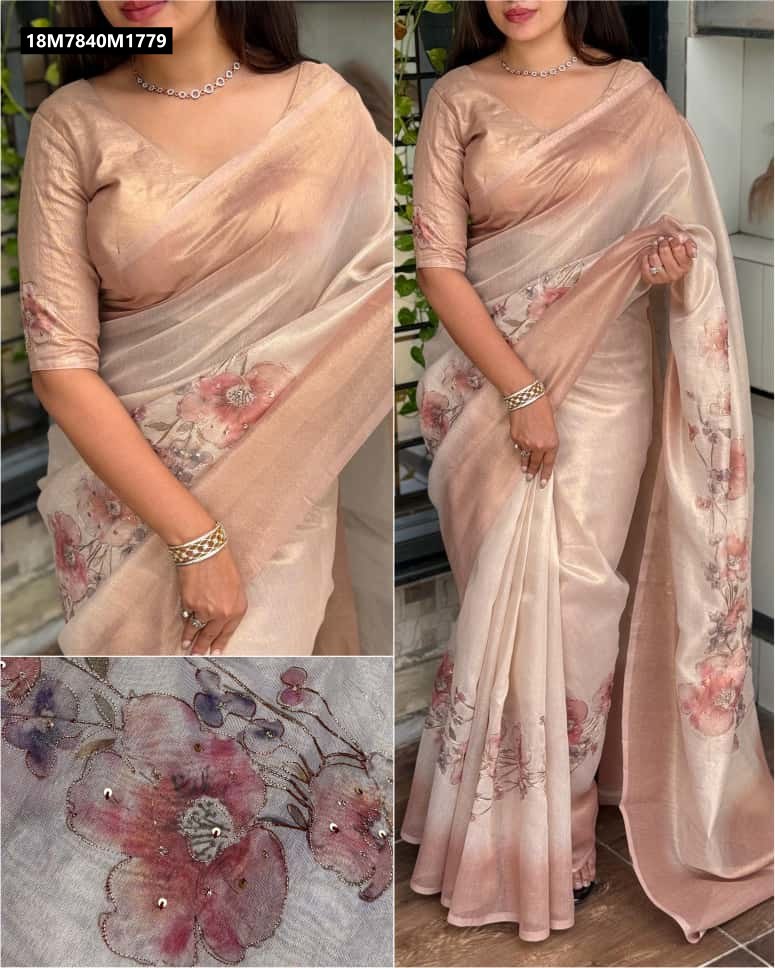 Model elegantly draped in the TRENDBUY Blush Cream Pure Taspa Silk Saree, featuring a matching blouse and delicate floral digital prints with sequin accents along the pallu and body, styled with minimalist jewelry.
