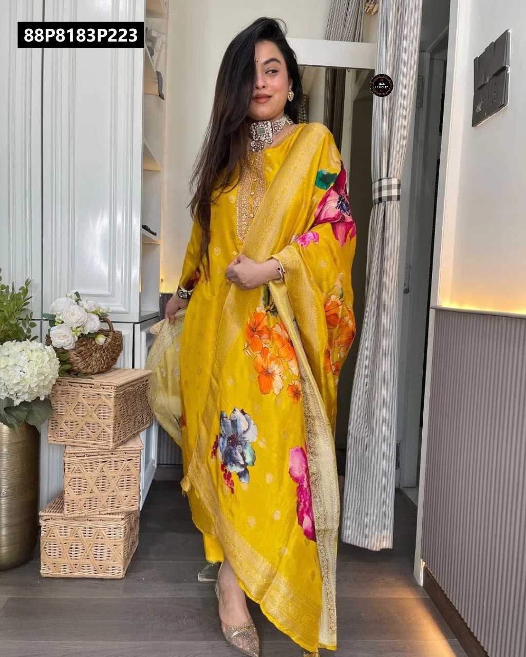 Full body shot of a model elegantly posing in the TRENDBUY yellow Organza Jacquard kurti set, highlighting the rich floral printed jacquard heavy dupatta and the overall ensemble.