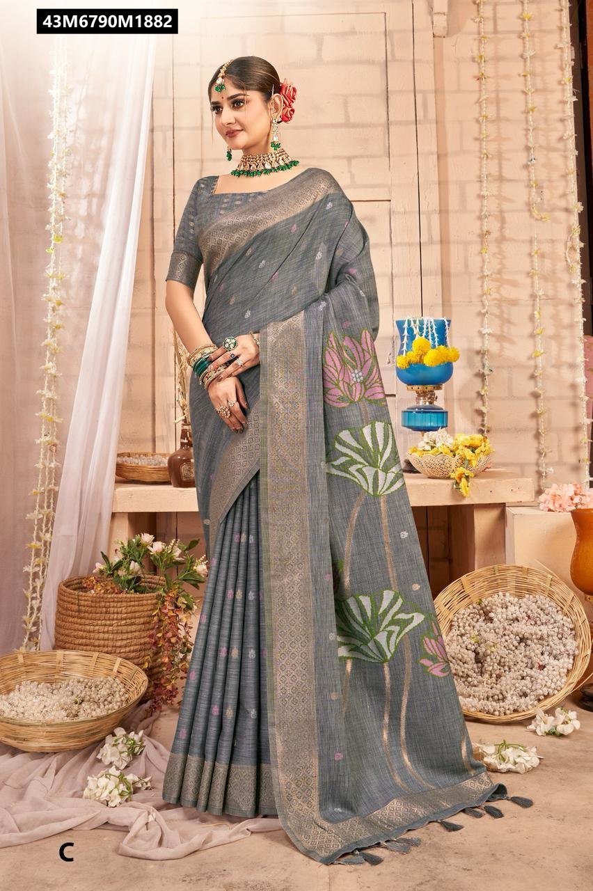 Model in a sophisticated grey TRENDBUY linen jacquard saree with a pink and green floral pallu, zari border, and weaving buttis, standing elegantly amidst traditional decor.