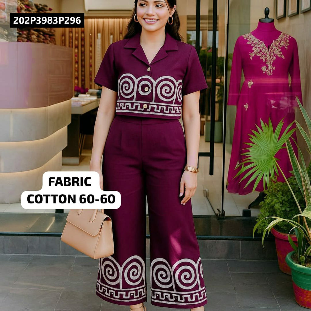 TRENDBUY Maroon Cotton Co-ord Set model, elegant full body pose with handbag, showcasing embroidered crop top and palazzo, "COTTON 60-60" fabric detail