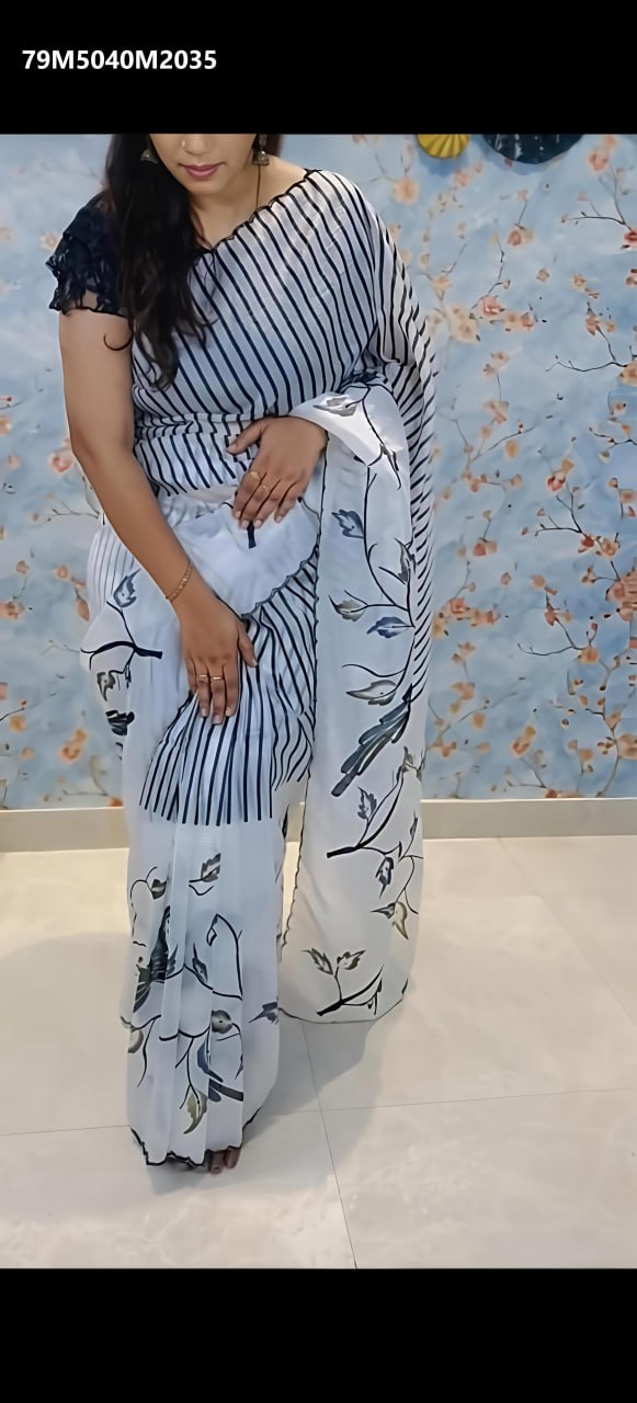 Model wearing the TRENDBUY white georgette saree, displaying the digital bird print on the pallu and striped body draped elegantly.