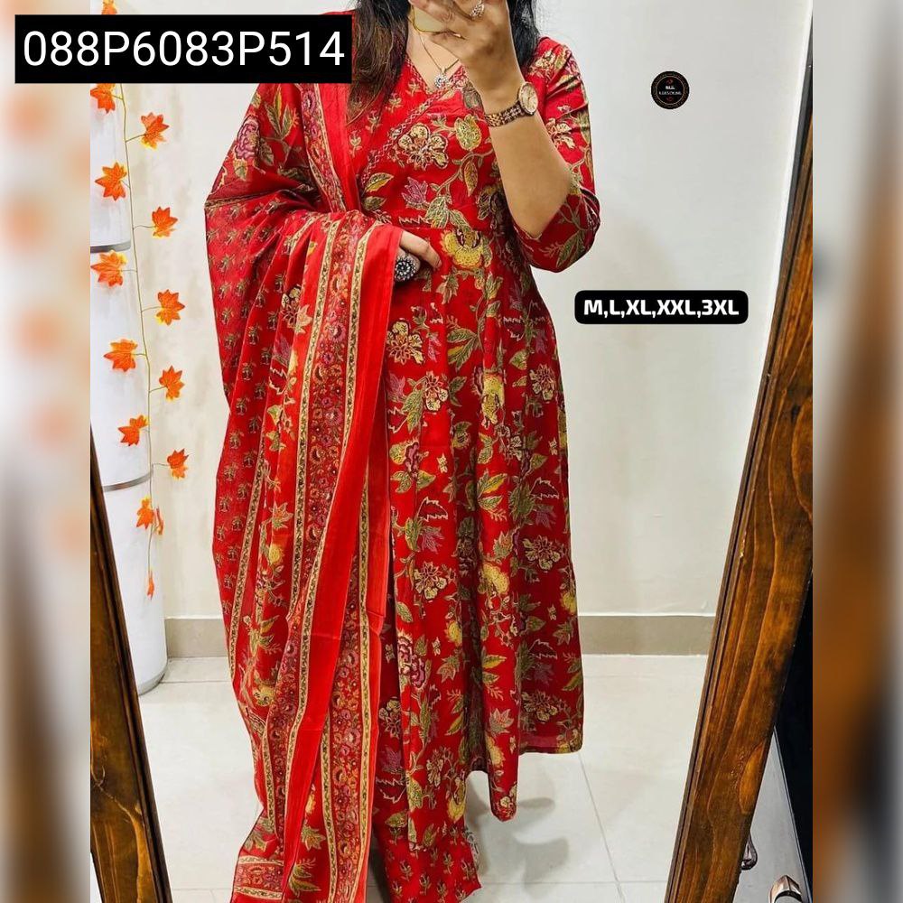 Model posing in TRENDBUY Red Floral Print Anarkali Kurta Set, showcasing a gracefully embroidered yoke and flowing silhouette.