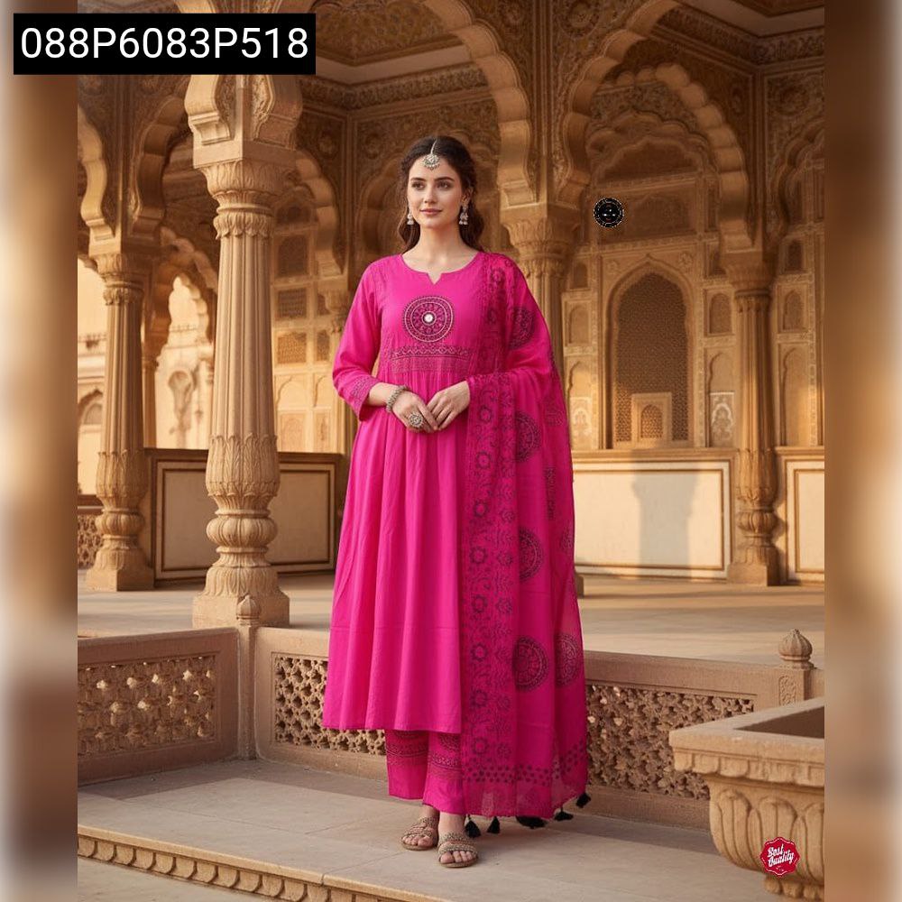 Model posing gracefully in a full body shot, wearing a hot pink TRENDBUY Anarkali kurta set with intricate sequence embroidery, against an ornate architectural background.
