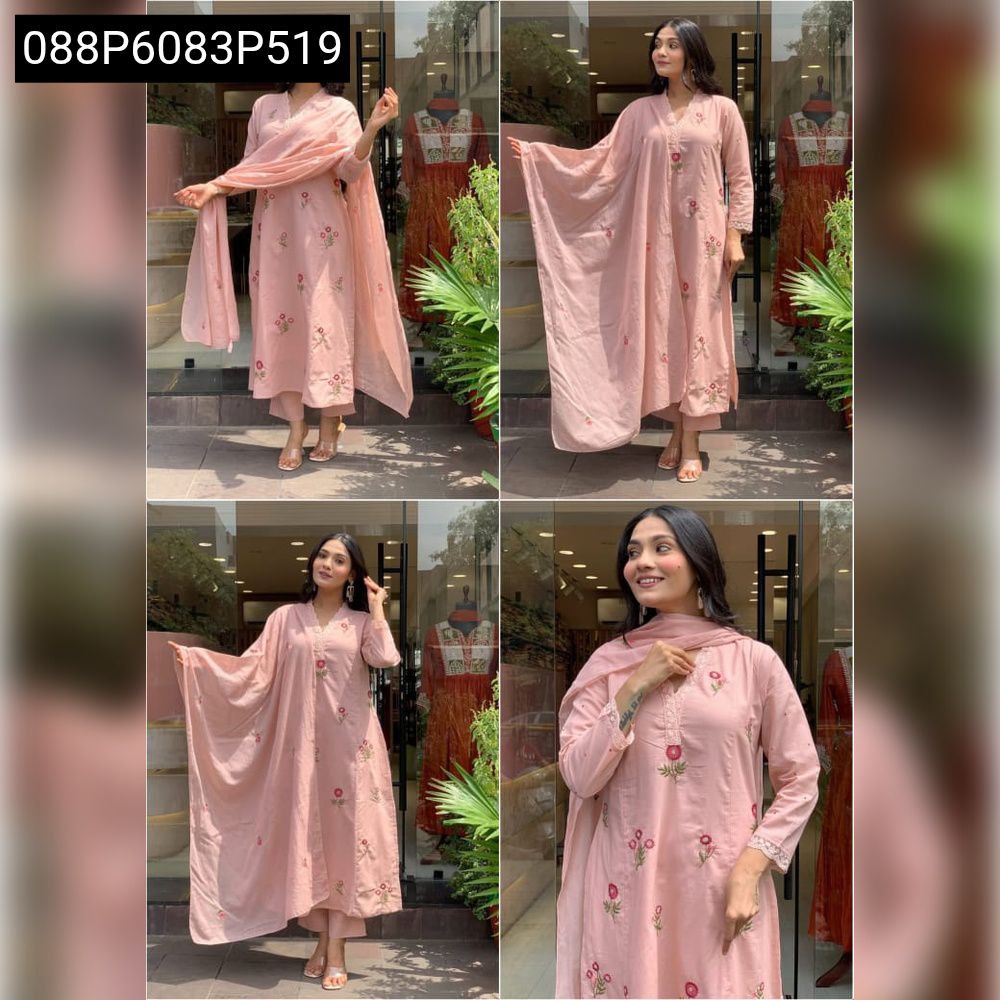 Full shot of model showcasing the blush pink embroidered cotton kurta set with malmal dupatta, posing confidently in an outdoor setting.