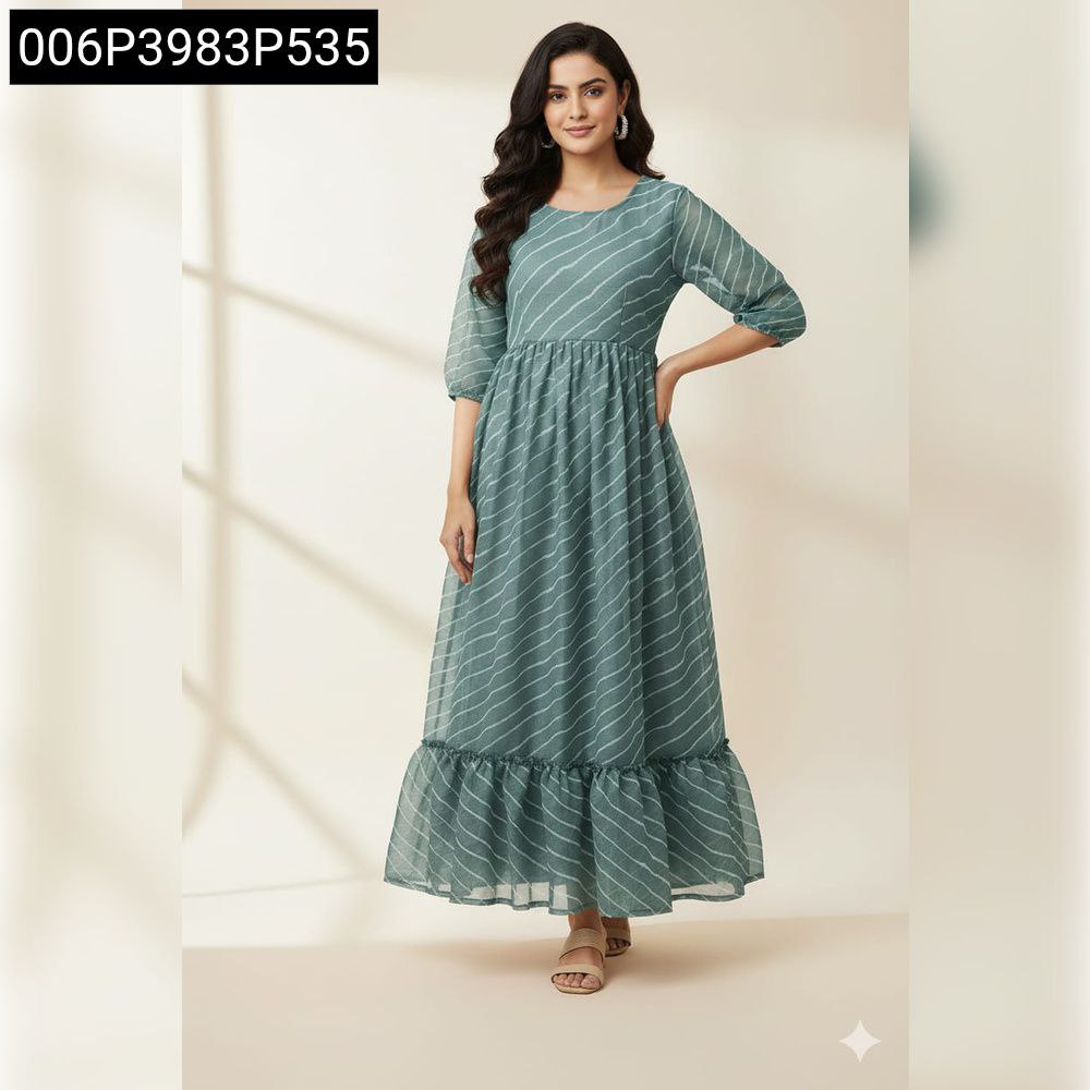 TRENDBUY model wearing a teal green Shimmer Chiffon Leheriya Print Maxi Dress with ruffled hem and round neck