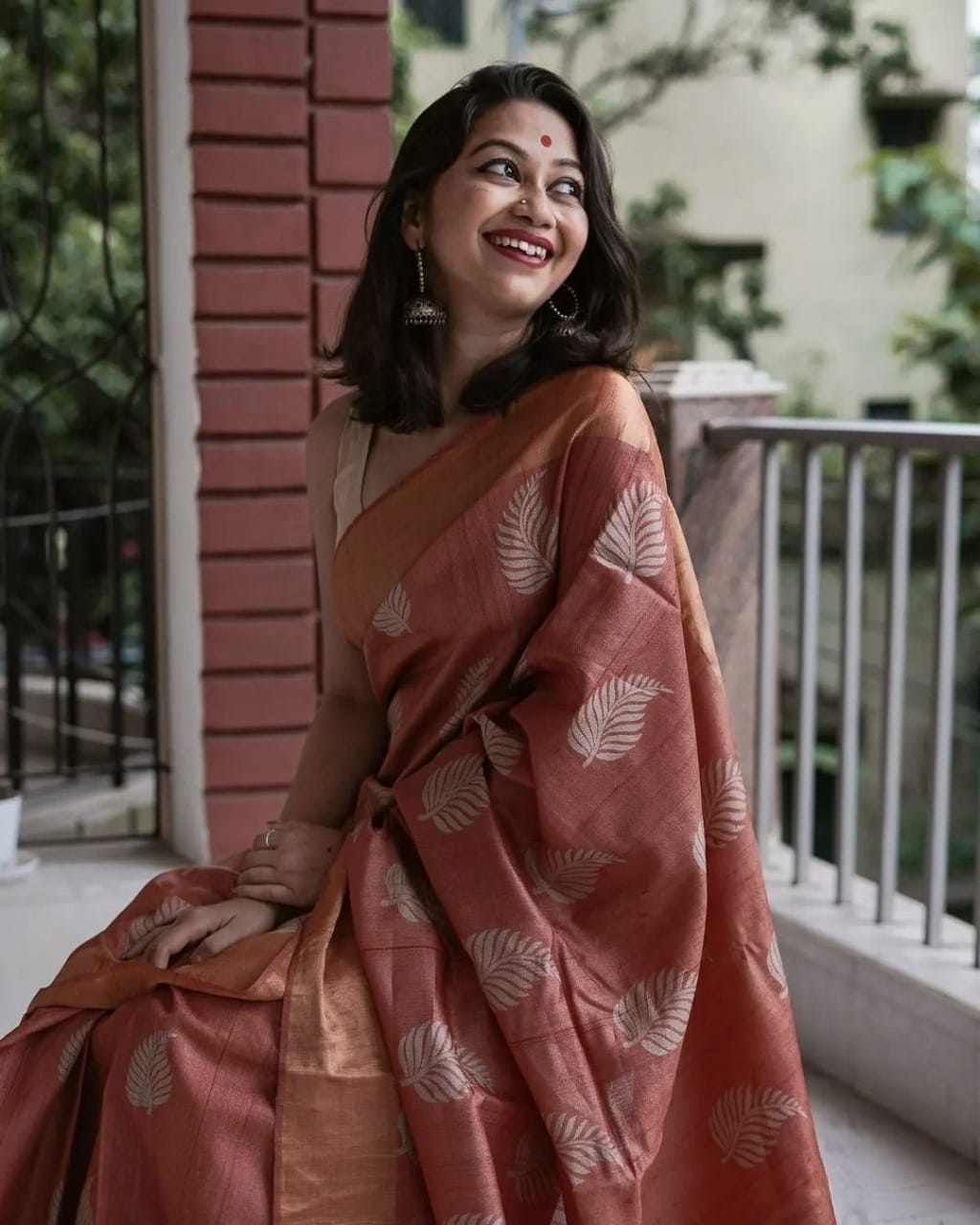 Banarsi soft silk saree with intricate copper jari leaf weaving