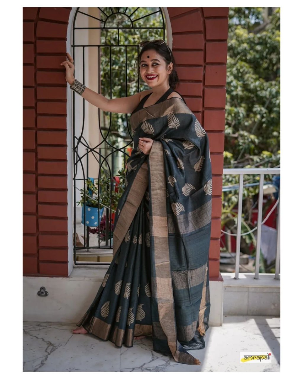Exquisite Banarsi soft silk saree with stunning copper jari leaf weaving and jacquard blouse.