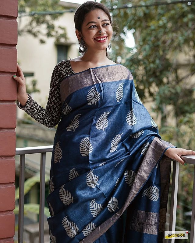 Banarsi soft silk saree showcasing detailed copper jari leaf weaving