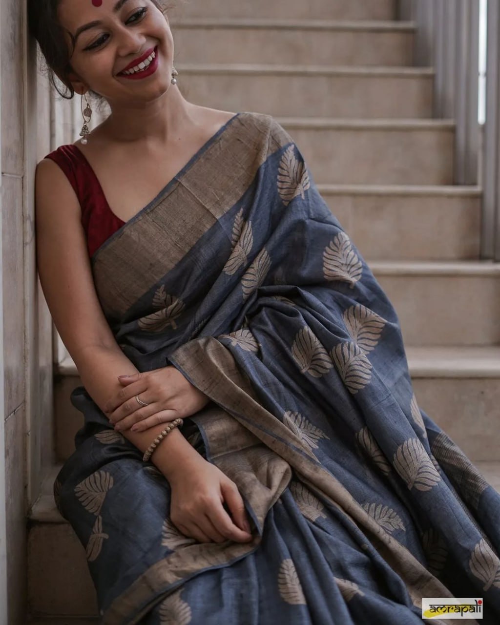 Exquisite Banarsi soft silk saree with copper jari leaf weaving and matching jacquard blouse.