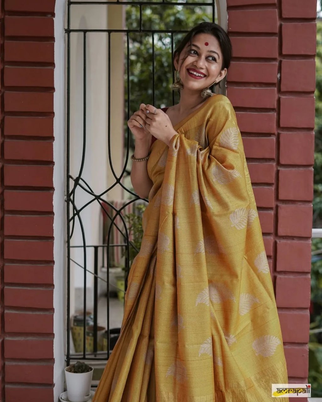 Exquisite Banarsi soft silk saree, copper Jari leaf weaving, and matching jacquard blouse.