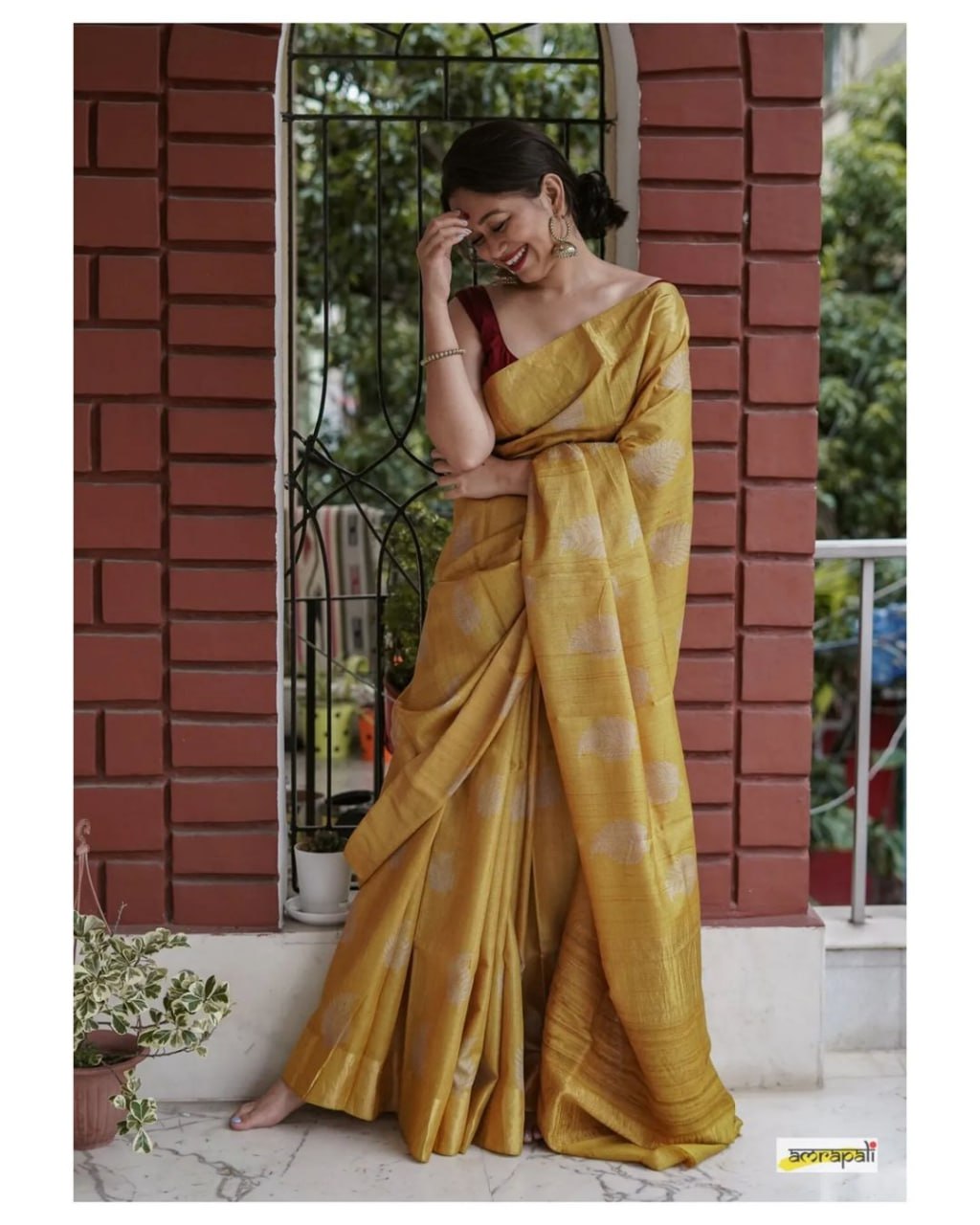 Exquisite Banarsi soft silk saree with elegant copper jari leaf weaving and matching jacquard blouse.