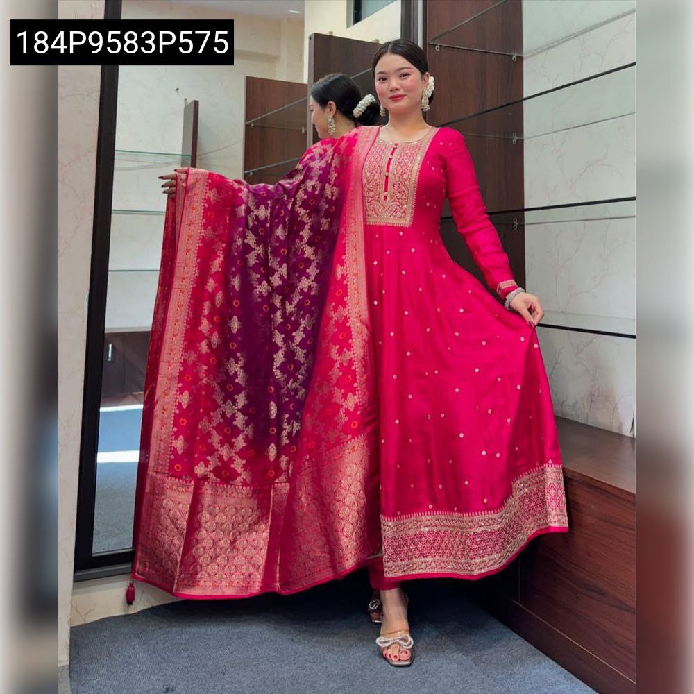 TRENDBUY model posing elegantly, swirling the flared hot pink Anarkali kurti and purple Banarasi dupatta to show movement.