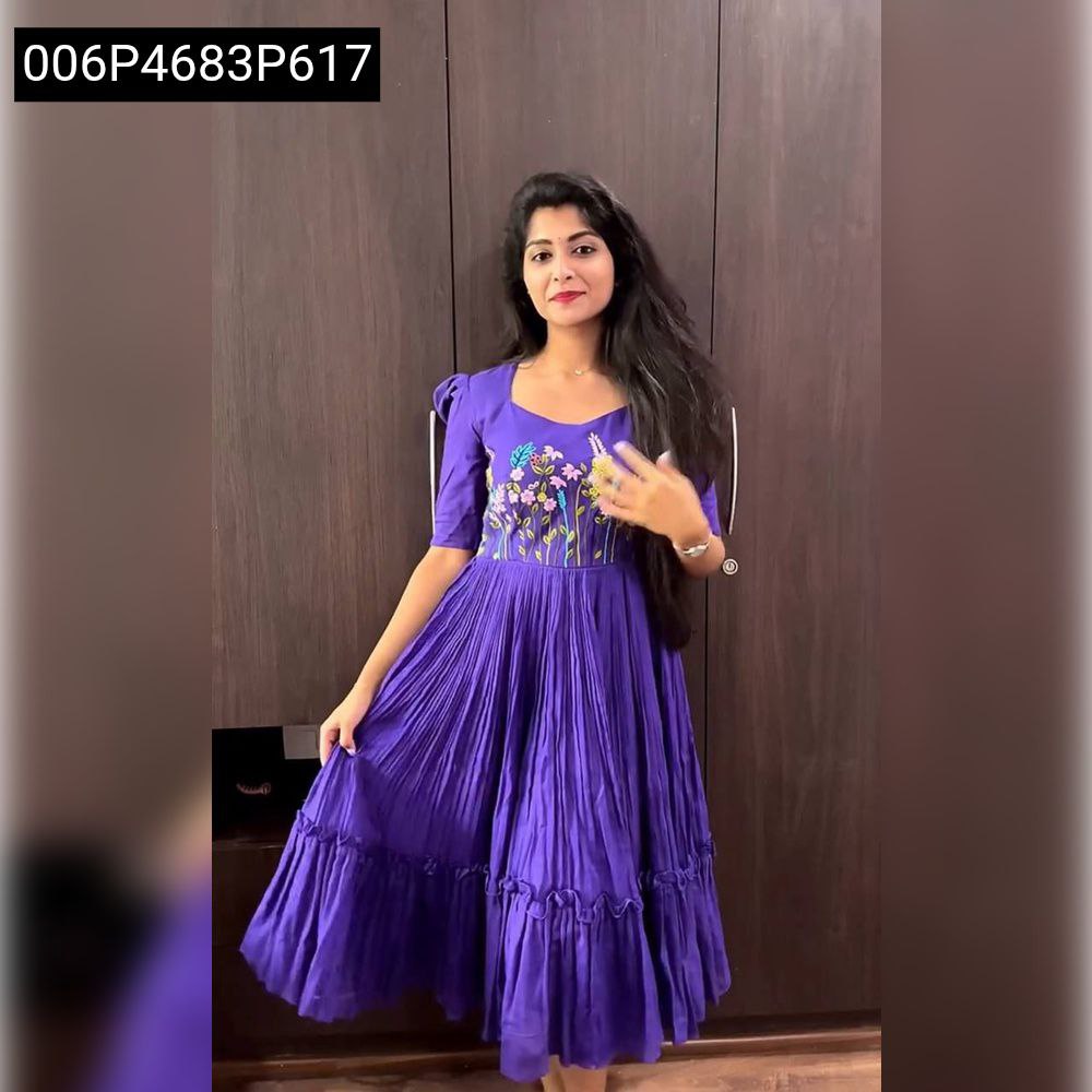 Model showcasing TRENDBUY purple Maska Cotton embroidered midi dress, posing gracefully in an indoor setting.