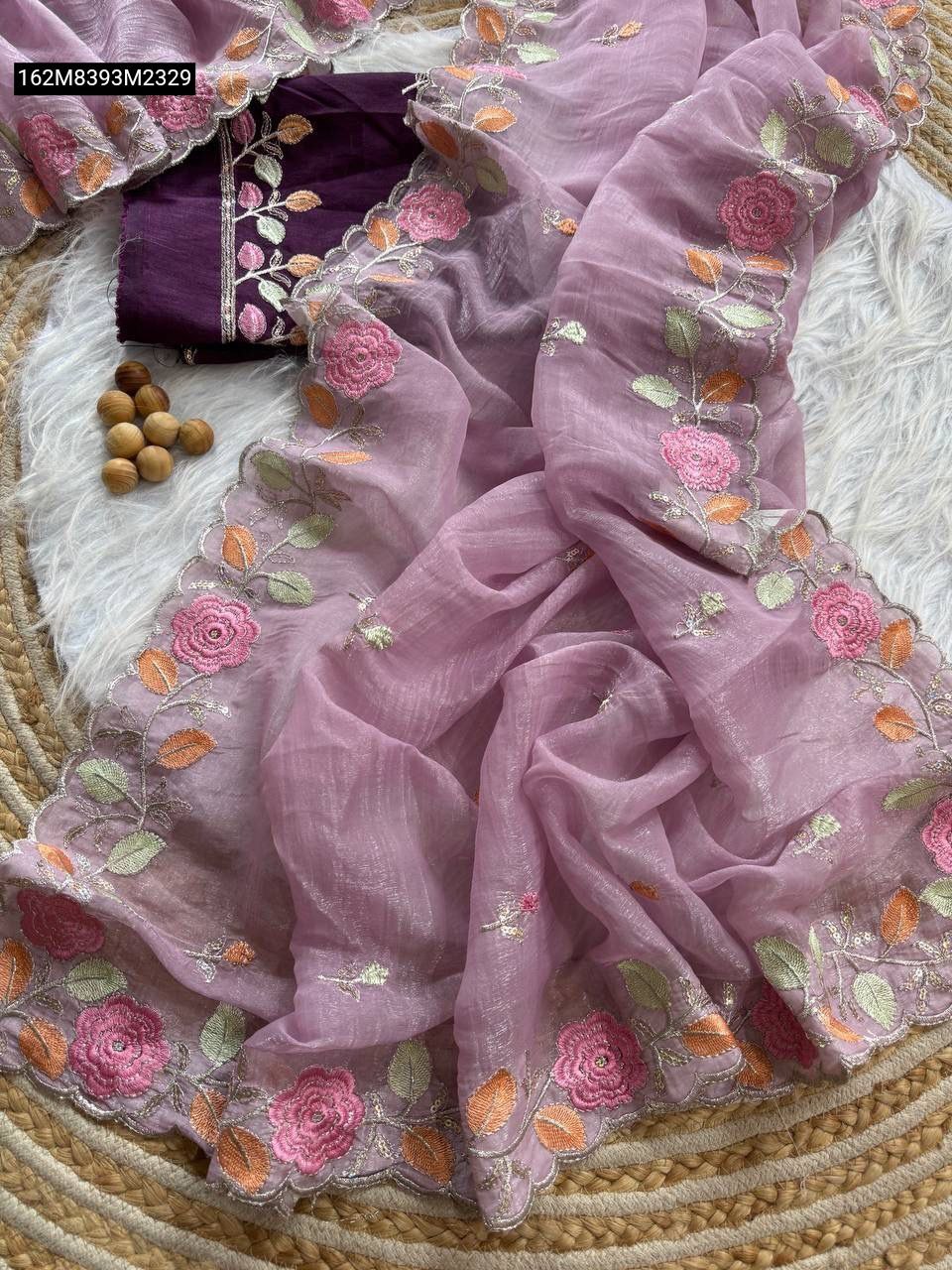 Draped TRENDBUY Lavender Crinchy Chiffon saree with intricate floral scalloped embroidery and dark purple blouse piece.