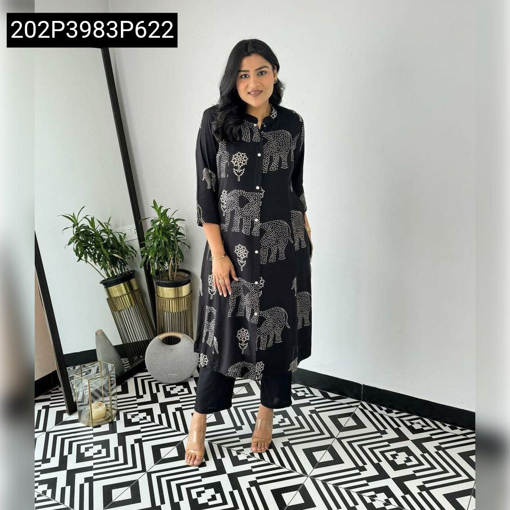 Female model showcasing TRENDBUY Black Elephant Print Rayon Cotton Co-ord Set with heels.
