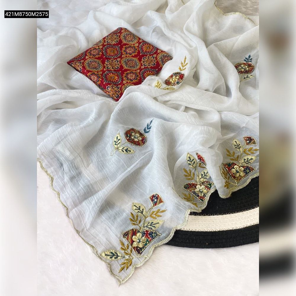 Close-up of handmade Ajrak patchwork border with intricate cutwork detailing