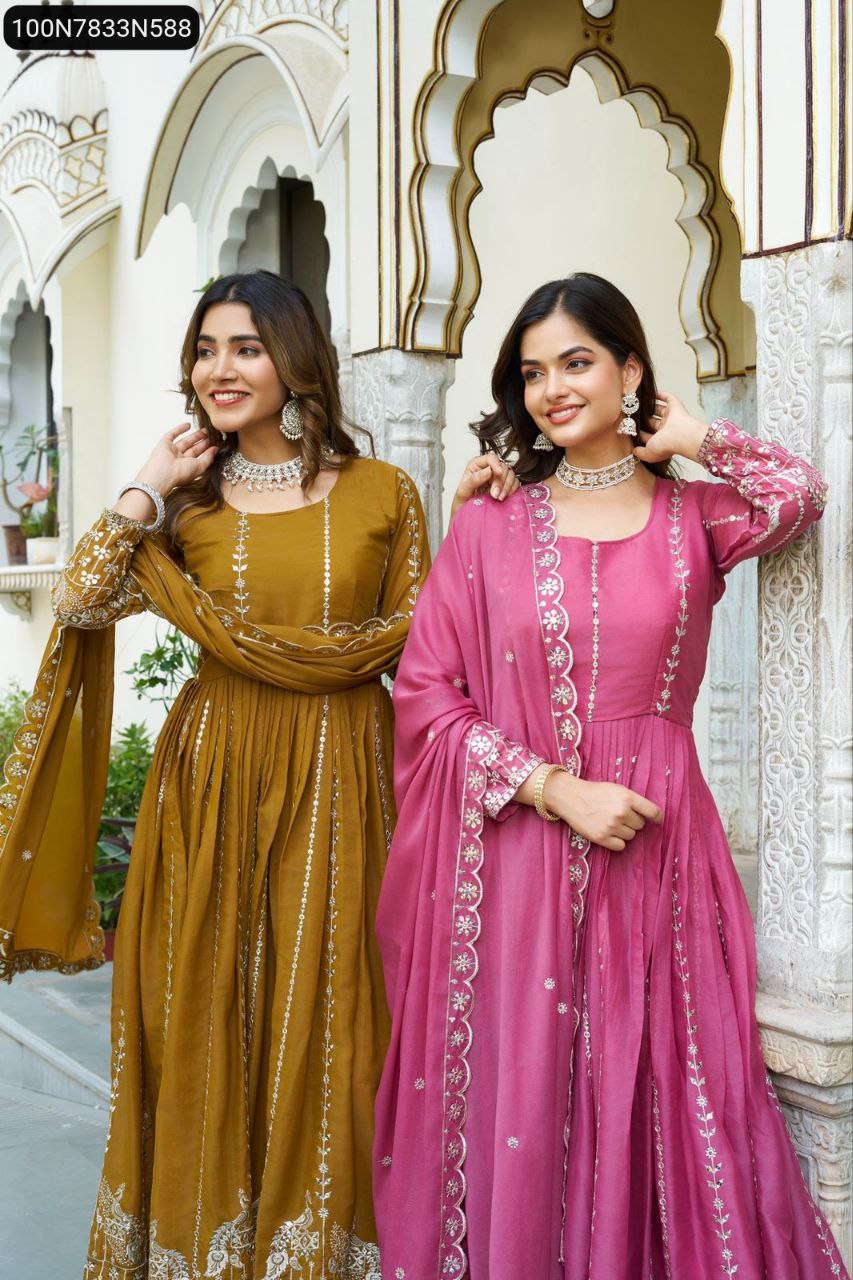 Two smiling models showcasing Rose Pink and Mustard Yellow Star Georgette gowns outdoors.