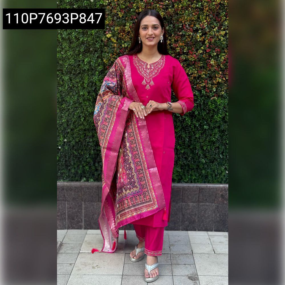 Woman in Rani Pink Roman Silk embroidered kurti set with Lichi Silk jacquard dupatta, full body shot