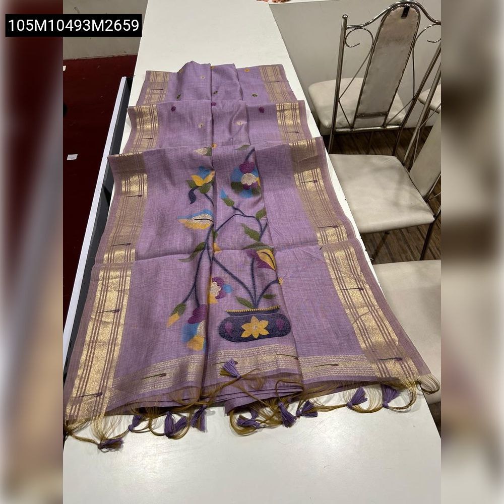TRENDBUY Lavender Muga Cotton saree with intricate floral Paithani pallu and golden zari border design, elegantly displayed.
