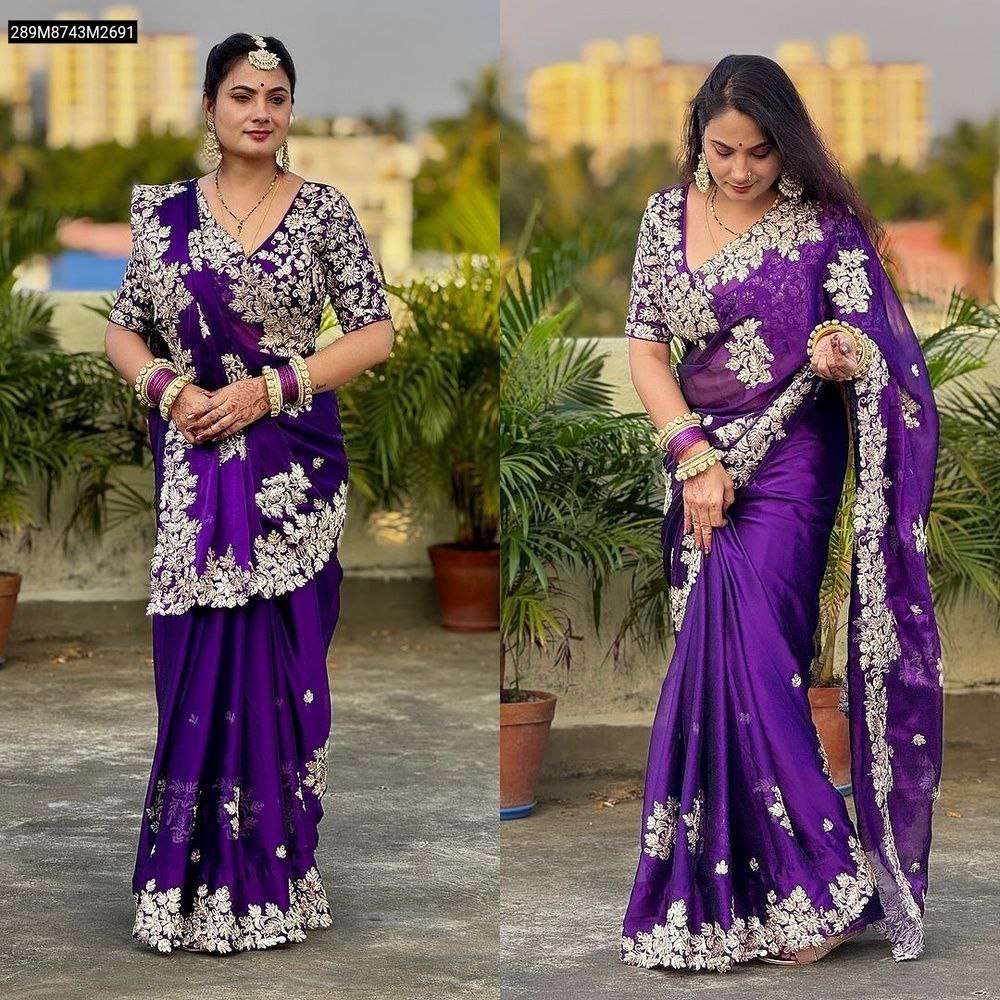 Model wearing the TRENDBUY purple Rangoli silk saree with golden embroidery, captured in two elegant poses on an outdoor balcony setting.