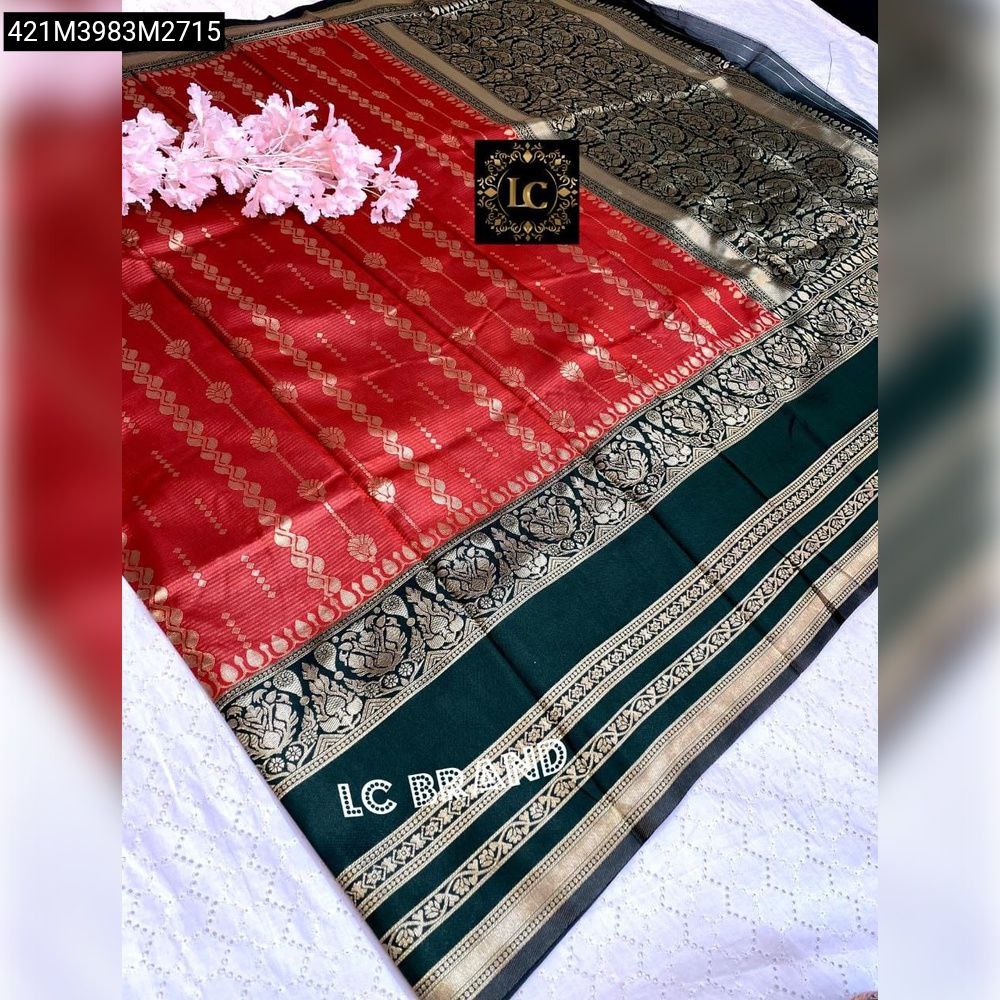 TRENDBUY Fancy Soft Silk Saree in Red with dark green contrast border and pallu, featuring all-over creamish gold weaving and intricate patterns, draped gracefully.