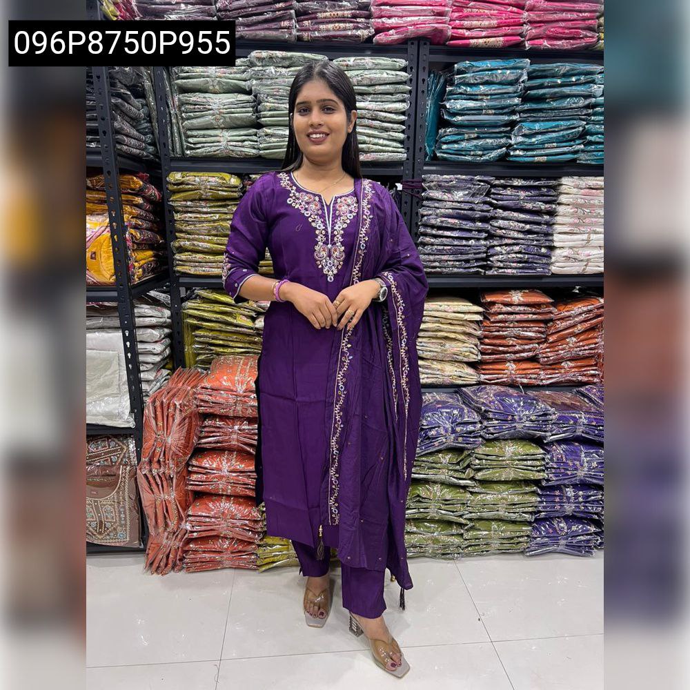 Full body model wearing Regal Purple Hand Work Kurti Pant Dupatta Set in a retail store.