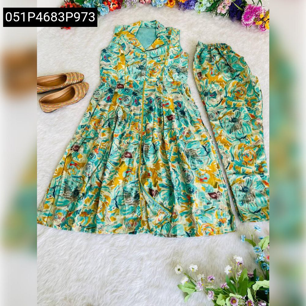 Flat lay Aqua Floral Kurta Pant Set on fur rug with shoes.