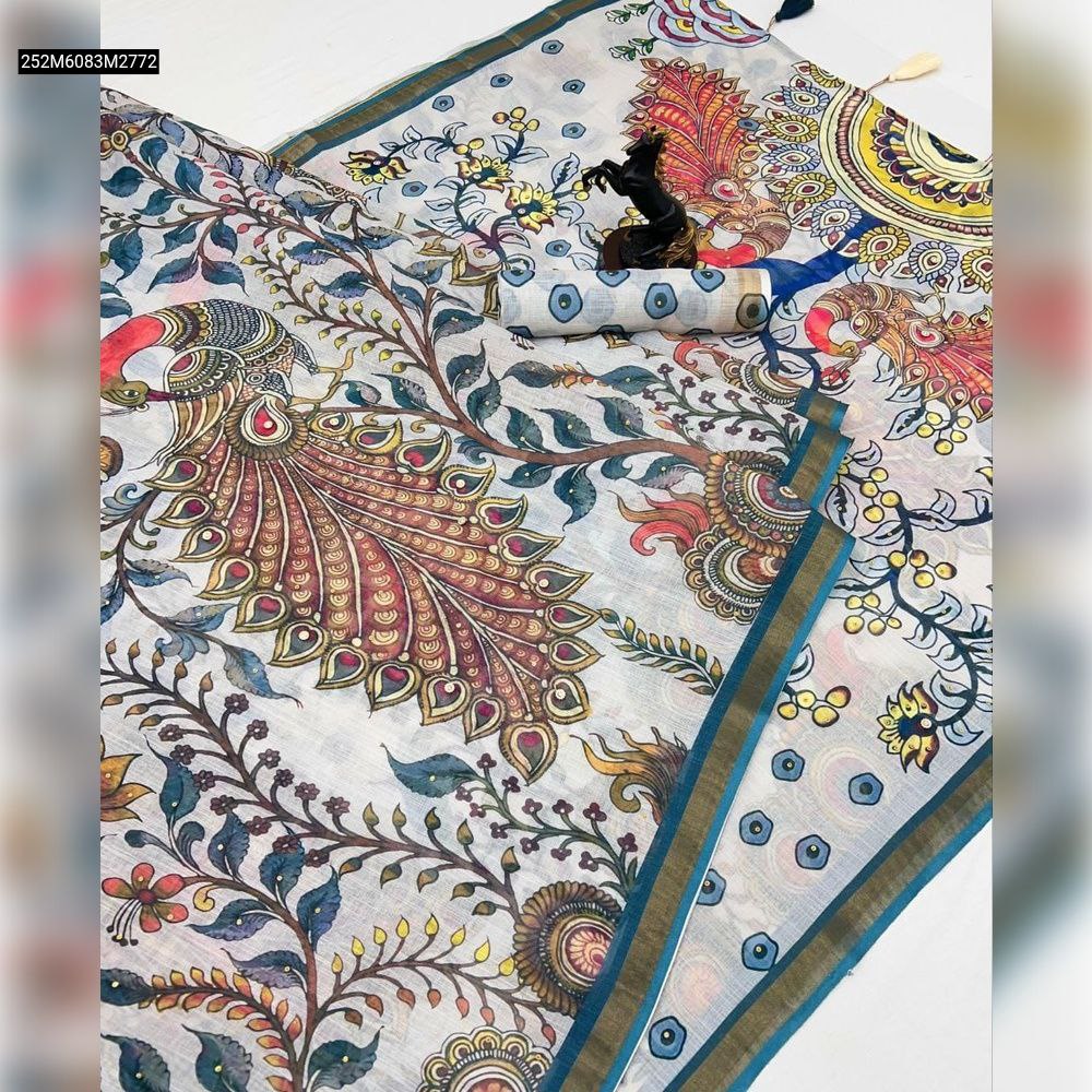 TRENDBUY Off-White Pure Linen Saree with Digital Kalamkari Peacock Print and Teal-Gold Zari Border, elegantly folded on a white surface with a rolled blouse piece.