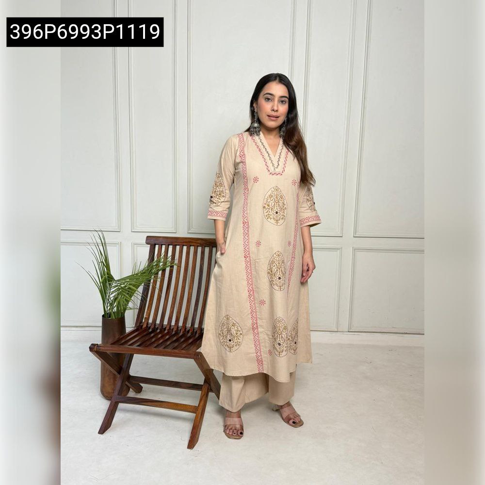 Full-body shot of model gracefully posing in Classic Beige A-line Kurti and Plazo Set.