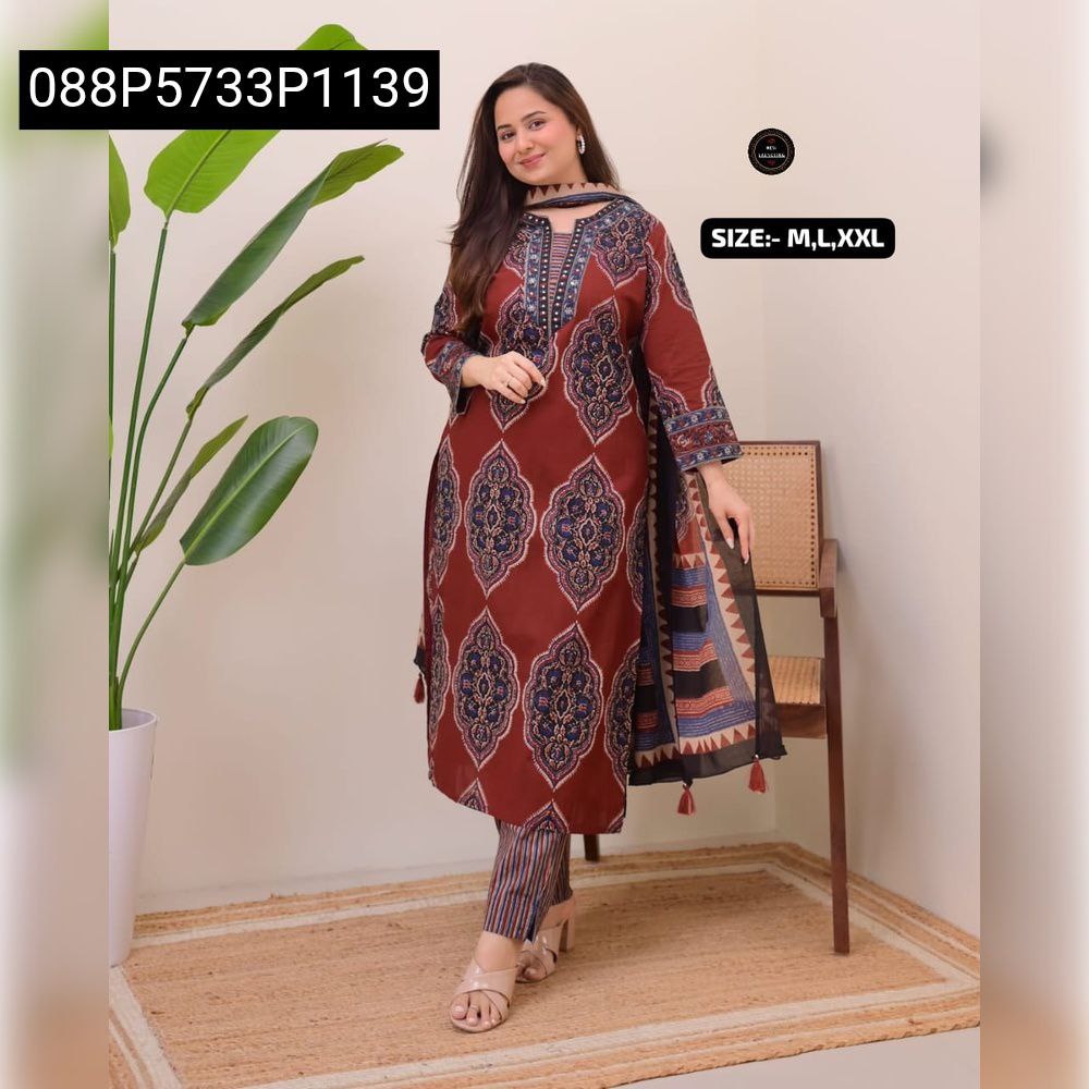 Model showcasing Women's Maroon Saganeri Print Straight Kurti Set with matching dupatta and striped pants, ideal for festive and casual wear.