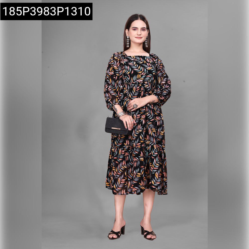 Model wearing black base multi-color leaf print georgette tiered midi dress, full body front pose