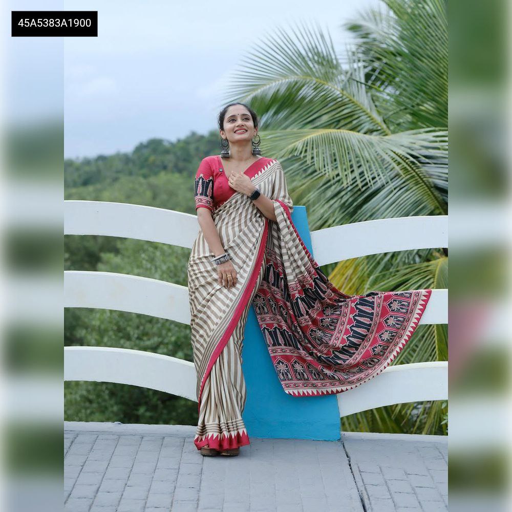 TRENDBUY model showcasing a Premium Satin Silk Striped Saree with Ajrakh pallu, front-facing pose