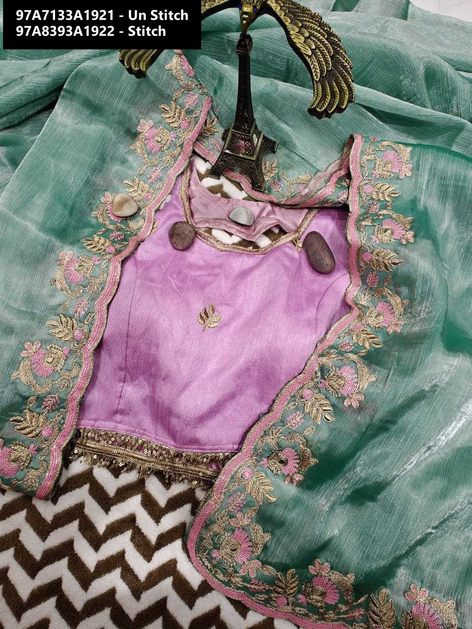 Full view of Aqua Green Saree with Lavender Blouse piece and decorative elements, highlighting the ensemble.