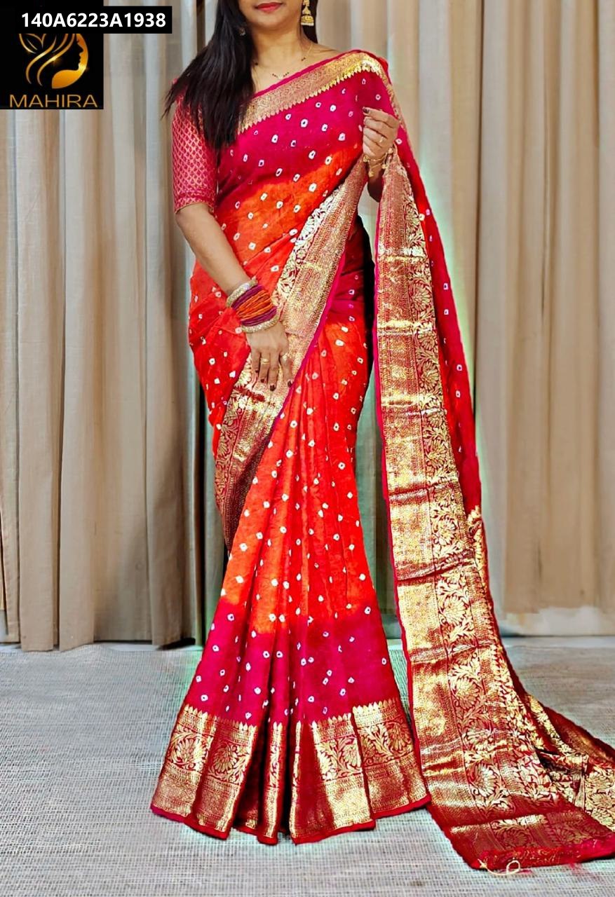 Model showcasing the TRENDBUY Hand Dyed Ombre Red & Orange Cotton Silk Saree with a traditional zari border