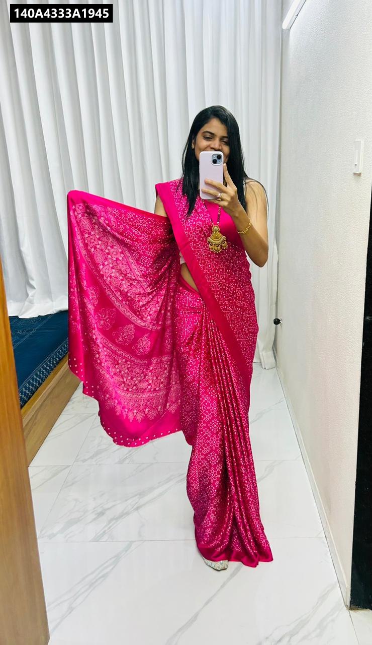 Woman in Rani Pink Gajji Bandhej Silk Saree, front view, holding pallu, for festive wear by TRENDBUY