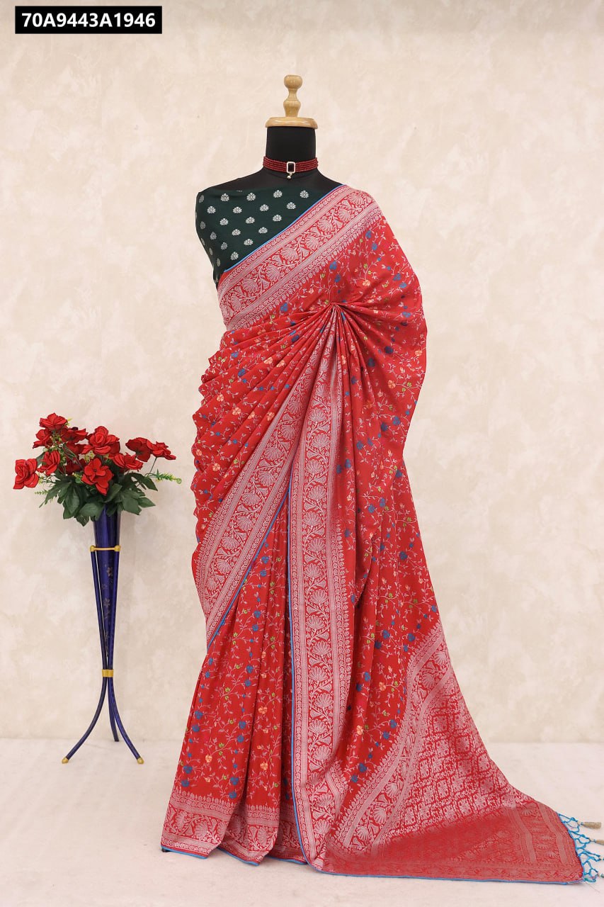 Red Pashmina Work Silk Saree on mannequin with emerald green contrast blouse, front view.
