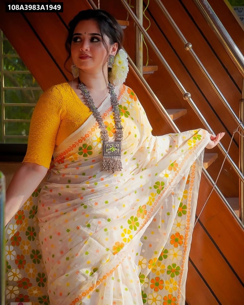 Full shot of woman in TRENDBUY Digital Floral Print Cotton Linen Saree walking up stairs