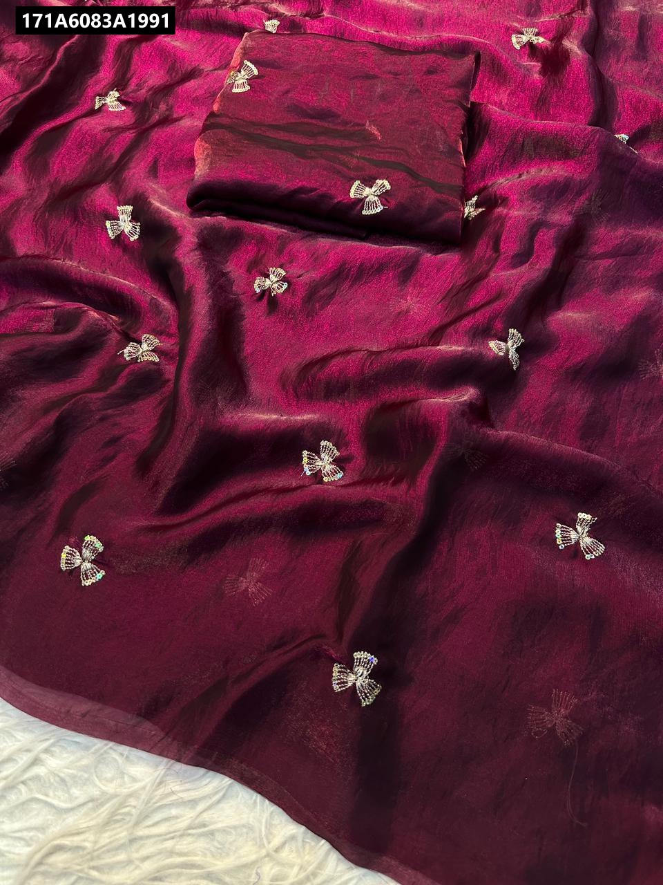 Dual Shaded Satin Zari Saree in Wine and Purple with matching unstitched blouse piece, flat lay.