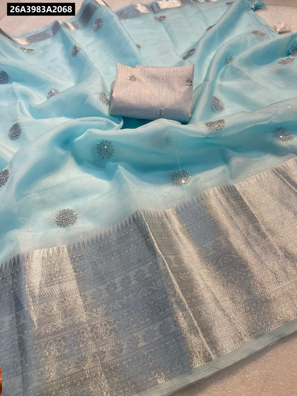 TRENDBUY Light Blue Kanchipuram Organza Jacquard Saree with Sequence Work and Raw Silk Blouse - Draped Flat Lay