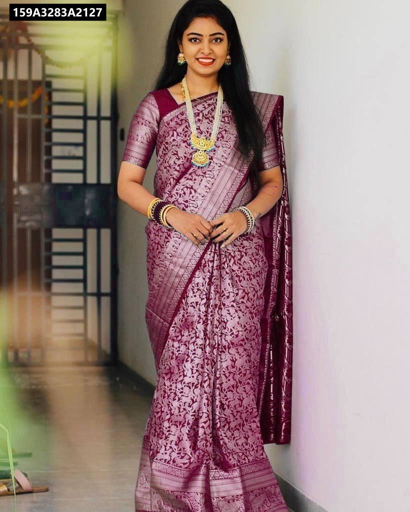 Front-facing model showcasing the full drape of a TRENDBUY Maroon Silver Lichi Silk Saree with rich silver zari patterns.