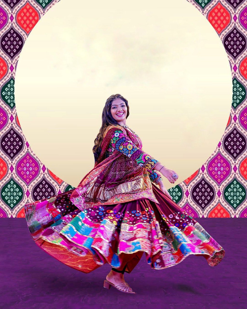 Woman in a spinning maroon and colorful patchwork Chaniya Choli with a decorative circular frame, TRENDBUY Navratri Special