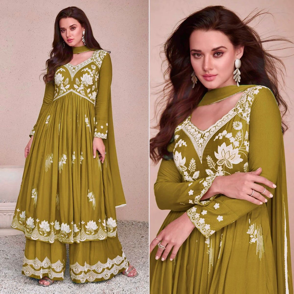 TRENDBUY model showcasing olive green Chinon silk Anarkali gown with white embroidery and palazzo.