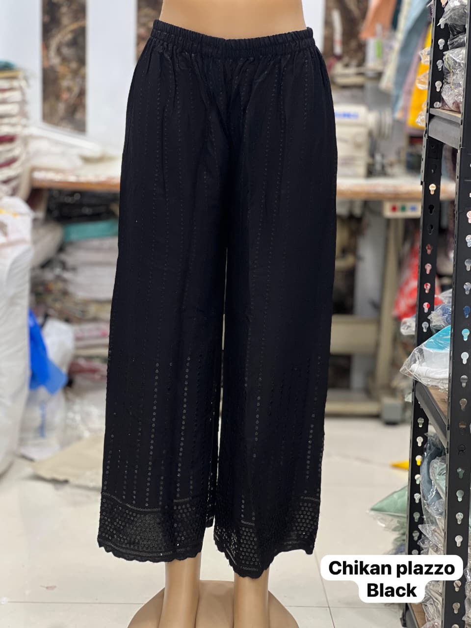 TRENDBUY Black Chikankari Rayon Palazzo on mannequin, showcasing intricate embroidery