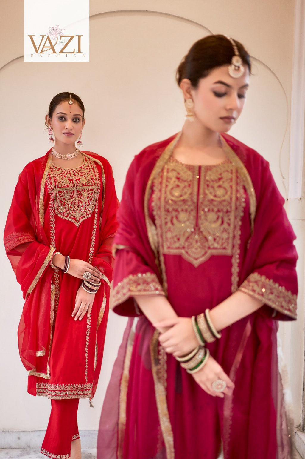 Model in Sindoor Red Roman silk kurta set with embroidery, another in Deep Magenta, posing elegantly.