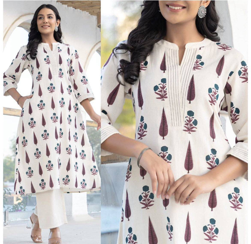 TRENDBUY Cakori Premium A-Line Kurta Set with maroon leaf and teal floral digital print, worn by a smiling woman.