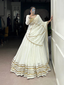 TRENDBUY White & Gold Navratri Special Rayon Lehenga Choli Set with Embossed Mirror Work